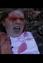 Janna Knight in Cannibal Cult (1999)