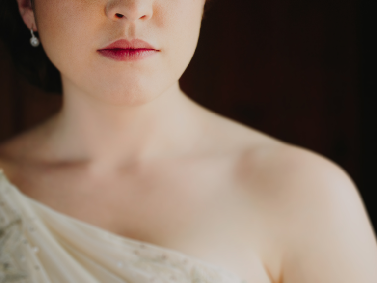 Bride wearing one shoulder gown