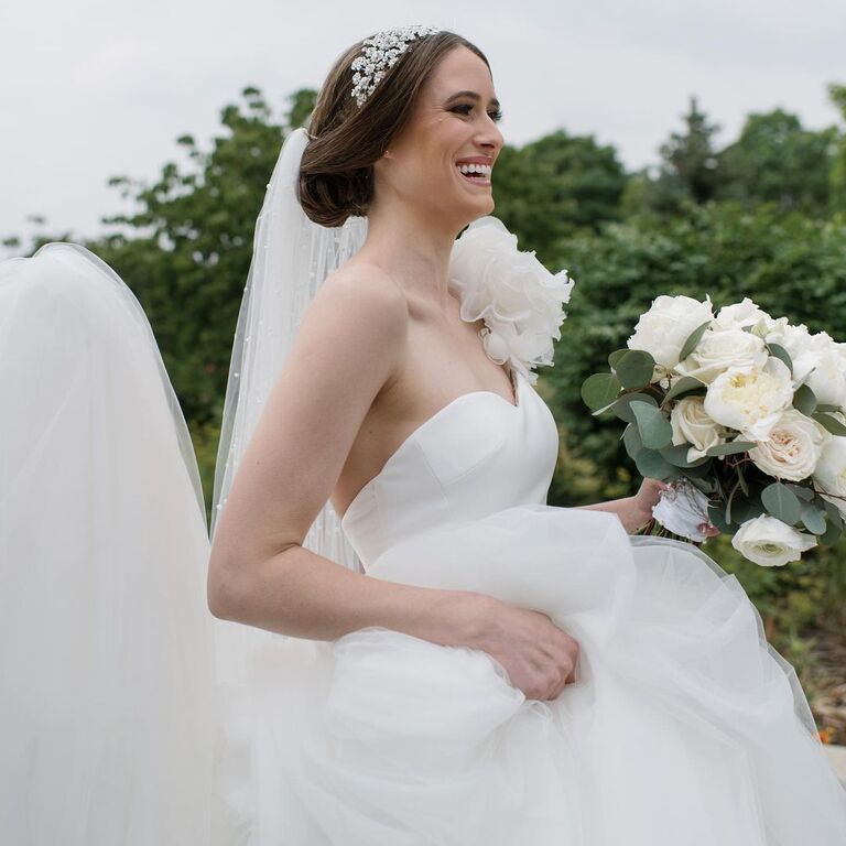 Updo with a Crystal Headpiece one shoulder gown bridal hairstyle