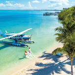 couple boarding seaplane in Key Largo, Florida