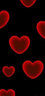 Vibrant red hearts on black background for mobile wallpaper.