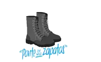 a pair of boots with the words " ponte mis zapatos " written below them