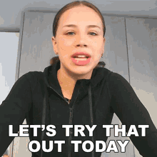 a woman says " let 's try that out today "