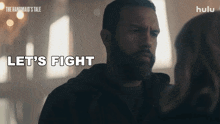 a man says let 's fight while looking at a woman