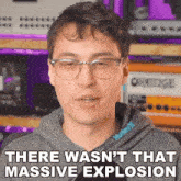a man wearing glasses and a hoodie says there wasn 't that massive explosion