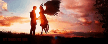 a man and a woman are holding hands in front of a sunset