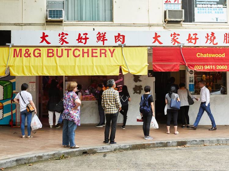 People standing outside M&G Butchery