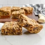 two peanut butter oatmeal bars on a white countertop.