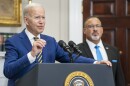 President Biden speaks behind a podium.