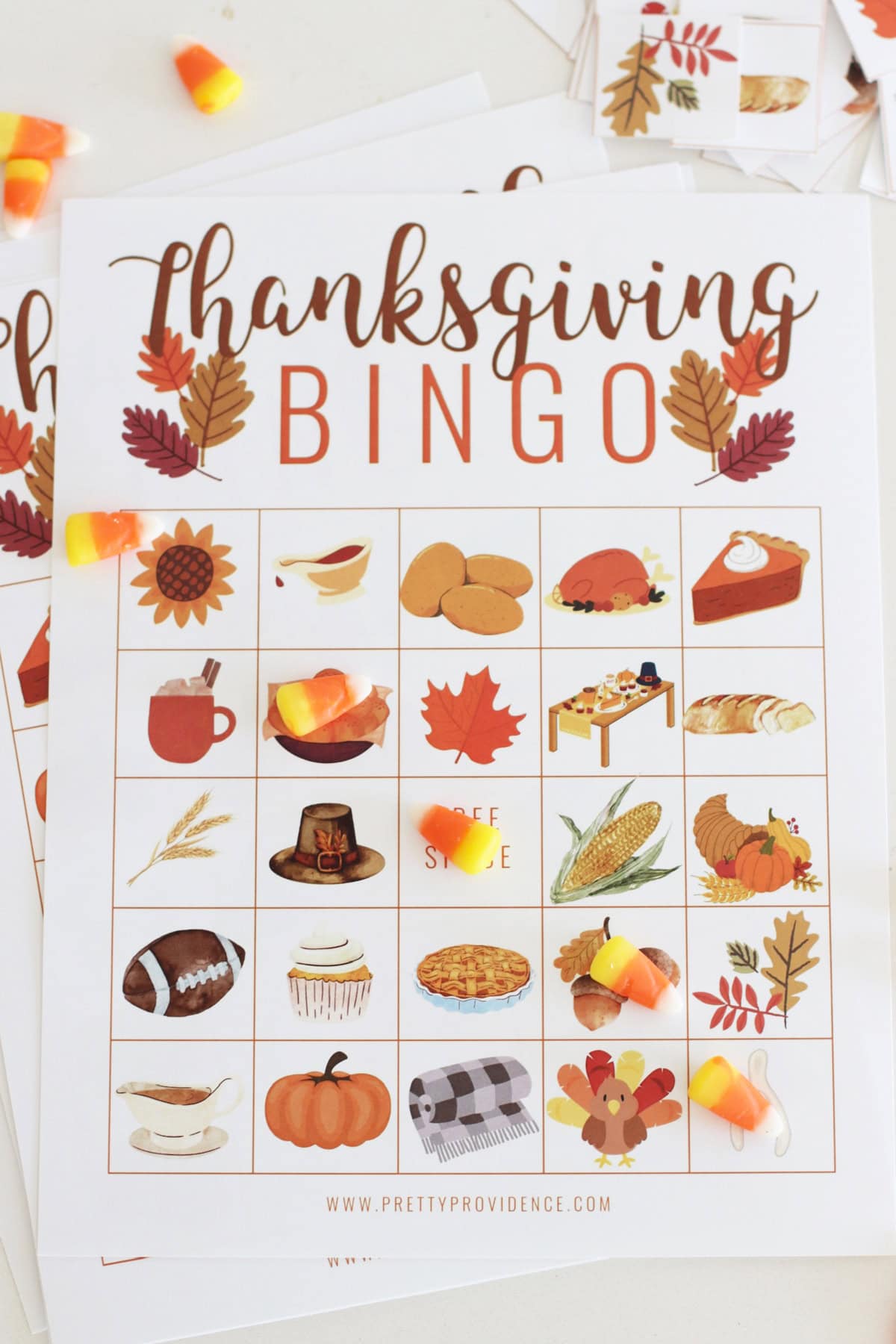 Thanksgiving bingo game using candy corn for markers. 