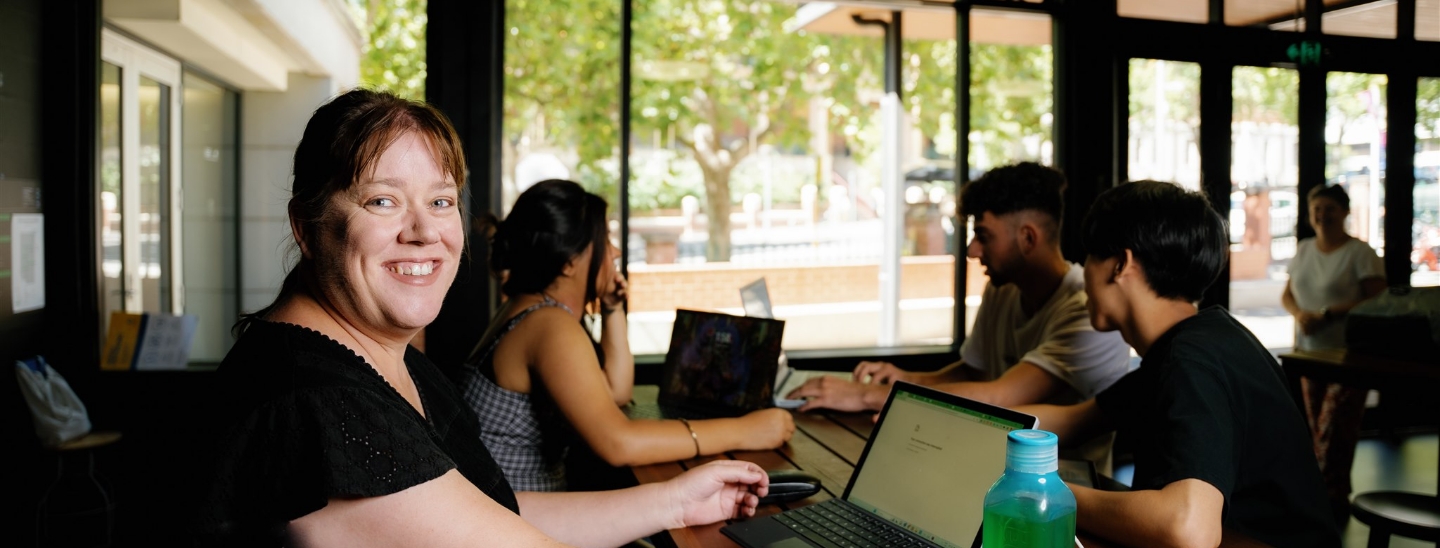 Student inside campus working studying