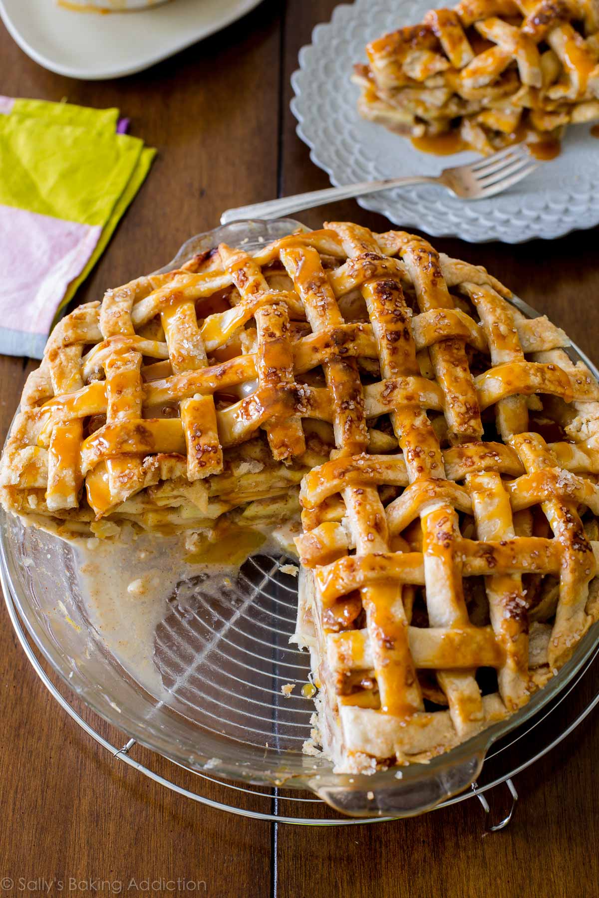 salted caramel apple pie with a slice removed