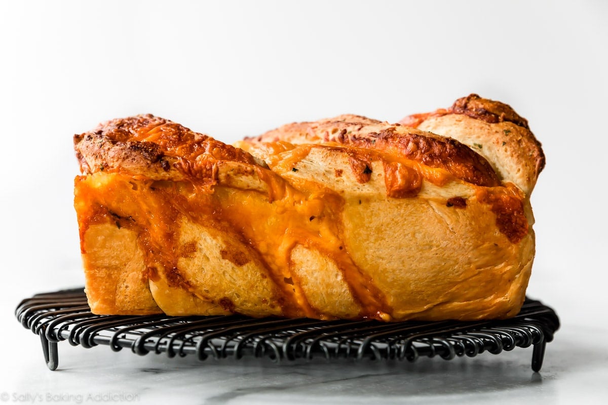 cheese loaf bread on cooling rack