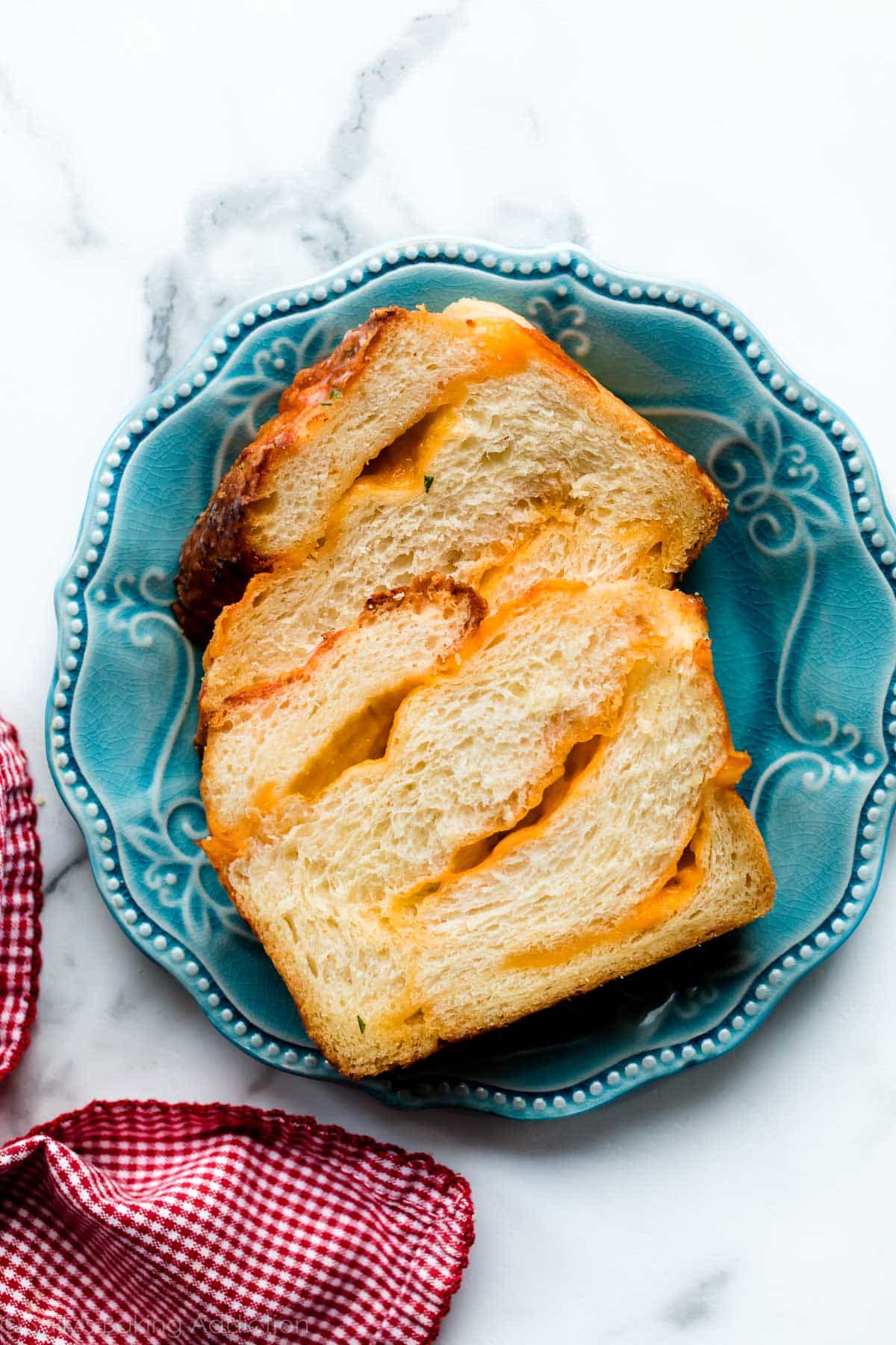 slices of cheese bread on a blue plate