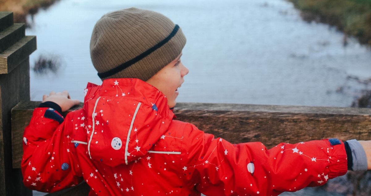 boy in a red coat by a river - feature image I won't make him cope