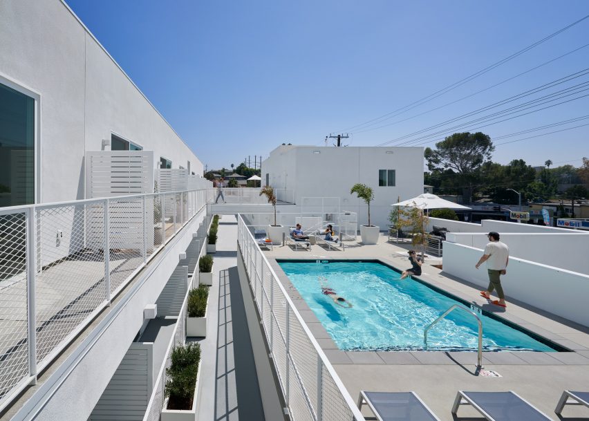 Rooftop swimming pool by LOHA