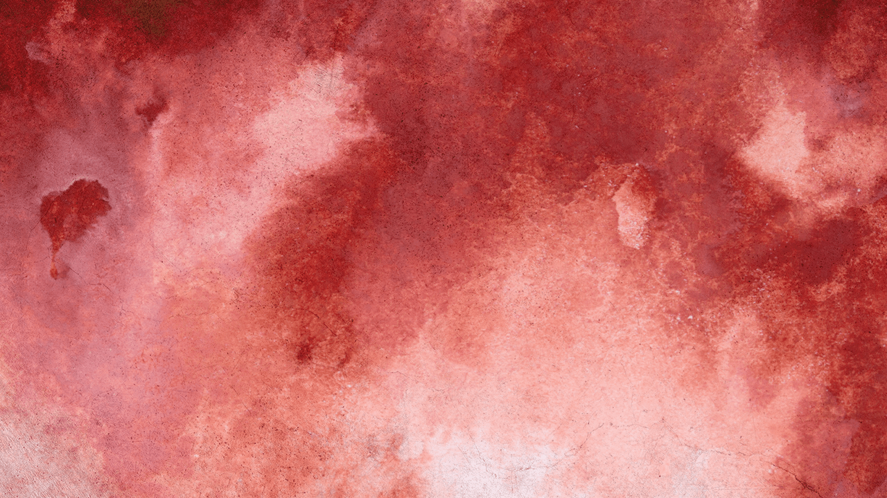 Blotchy red watercolor paint