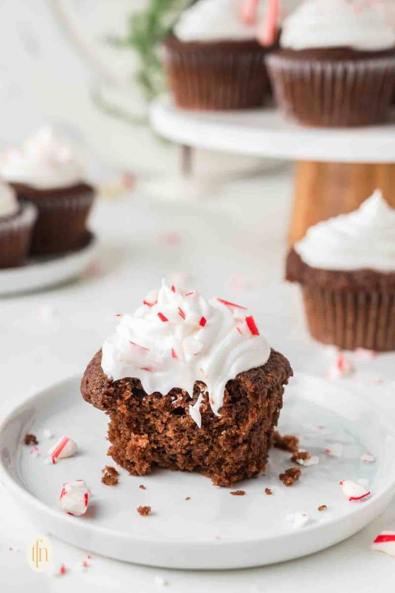 a Peppermint Cupcake with frosting on a plate.