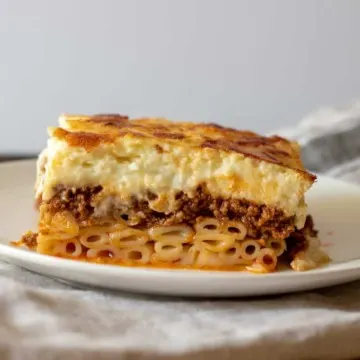 Slice of pastitsio on serving plate.