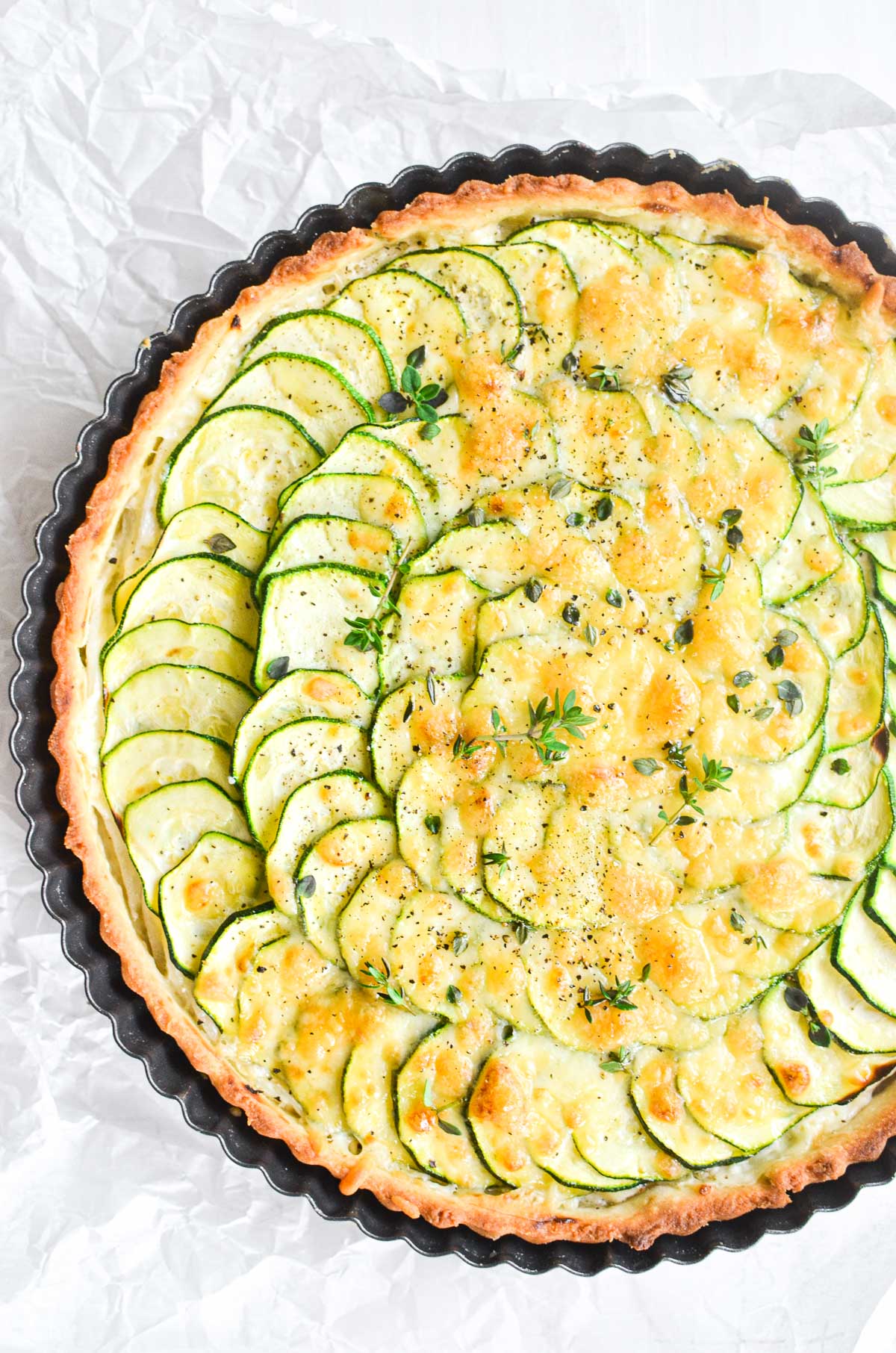 zucchini pie on parchment paper