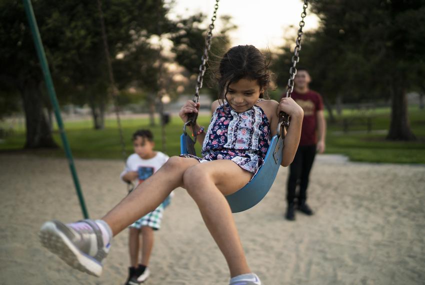 Heyli, her dad Carlos and her cousin Walter play in a park near their apartment in Los Angeles, California. Besides dealing with separation anxiety due to the nearly two months that they were separated after seeking asylum at the border, she is getting used to her new life in the United States.