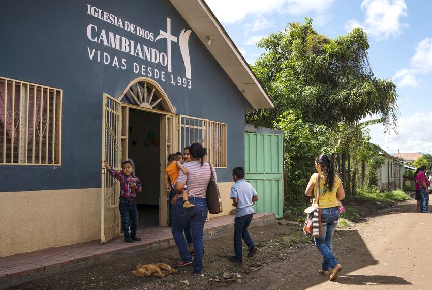 Claudia and her family attend Sunday church in Olancho, Honduras. She says that listening to the LordÃ­s word helps her deal with her current situation.
VerÃnica G. CÂ·rdenas for The Texas Tribune