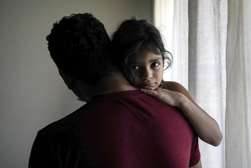 Heyli and her dad Carlos in their apartment in Los Angeles, California.