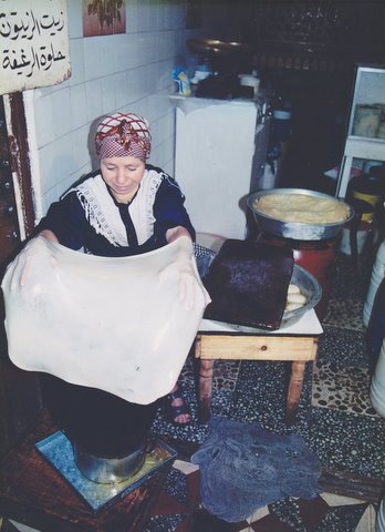 File:Woman made bread in Marocco..jpg