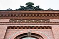 Deutsch: Alter Haupteingang des Universitätsklinikums Hamburg-Eppendorf (Gebäude O35), Fassadendetail. This is a photograph of an architectural monument. It is on the list of cultural monuments of Hamburg, no. 20779.