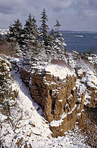 Rocky coast with winter snow