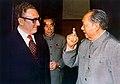 Henry Kissinger and Chairman Mao, with Zhou Enlai behind them in Beijing, early 70s.