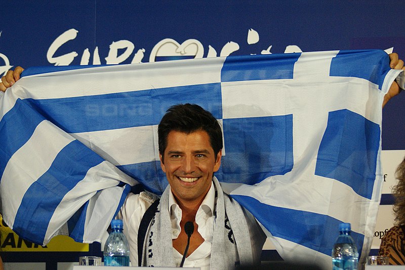 File:Sakis Rouvas Raising Greek Flag.jpg