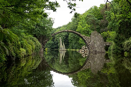 Rakotzbrücke (a.k.a The Devil’s Bridge) is located in Azalea and Rhododendron Park Kromlau