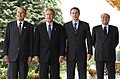 With George W. Bush, Tony Blair and Silvio Berlusconi in Evian, France, on June 2, 2003.