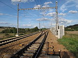 Čeština: Železniční trať 170 v Holoubkově. Okres Rokycany, Česká republika. English: Railway line 170 in Holoubkov village, Rokycany District, Czech Republic.