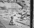 A terrified baby left in Shanghai's South Station after a Japanese bombing