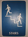 Blue stairs sign with braille