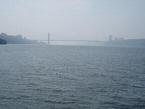 Looking downriver from the Circle Line Sightseeing Cruises boat. The George Washington Bridge can be seen in the background.