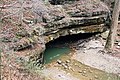 * Nomination River Styx emerges in Mammoth Cave NP, Kentucky. --Dschwen 17:25, 28 November 2007 (UTC) * Promotion A little bit pale, but otherwise good quality. -- MJJR 21:23, 5 December 2007 (UTC)