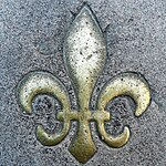 Fleur-de-Lys marker on stone