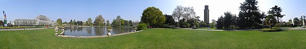 Panorama of Palm House and lake at the Royal Botanic Gardens, Kew