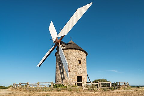 Moulin de Moidrey in France. The so I tried to catch the current look with current technical quality. The shape of the building is a truncated cone, which means that the vertical lines in photo cannot be exactly vertical.