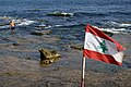 * Nomination Lebanese flag against the coastal backdrop with a random swimmer --Vladan Radmilović 09:58, 29 July 2009 (UTC) * Decline not sharp, composition unclear --Berthold Werner 17:15, 30 July 2009 (UTC)