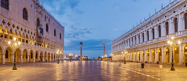 View of Piazzetta San Marco toward Grand Canal of Venice, at dawn, with Doges' Palace on the left and Biblioteca Marciana on the right. The two columns are, from left to right, Saint Mark's, protector of the city, and Saint Theodore's.