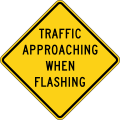 Warning that the road does not have the right of way at the upcoming blind intersection and that traffic may be approaching when the lights are flashing: highway=priority at the intersection highway=stop stop=minor at the stop line on this street flashing_lights=yes on the traffic sign