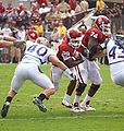 Oklahoma Sooner running back Chris Brown attempts a rush against the Tulsa Golden Hurricane in the 2009 season.