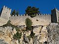 * Nomination Walls of the castle of San Marino. --Marcok 00:05, 7 August 2009 (UTC)  Info I know the perspective looks somehow strange. This is not only for the grandangular but for the geometric features of the subject itself: I was fascinated by that irregularity, so I don't try to correct perspective. --Marcok 19:29, 7 August 2009 (UTC) * Decline see perspective control and bad crop too --Alchemist-hp 10:58, 8 August 2009 (UTC)