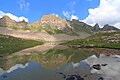 View on the Gialorgues Upper Lake (2483 m), with the Fort Carra summit (2880 m) in the right background.