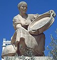 Aldonza Lorenzo. Detail of a monument to Cervantes in Madrid.