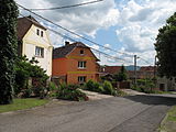 Čeština: Domy na návsi v Dobkovičkách. Okres Litoměřice, Česká republika. English: Houses at the village square at Dobkovičky village, Litoměřice District, Czech Republic.